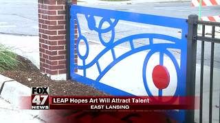 East Lansing fence transformed into piece of art