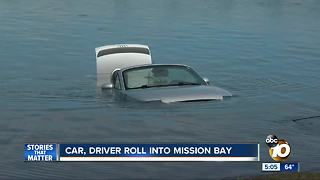 Car, driver roll into Mission Bay