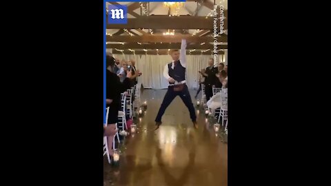 Hilarious flower 'boy' dances his way down aisle