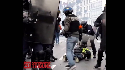 Globalism: French Riot Cops Literally Drag Yellow Vester Down Street by Her Hair