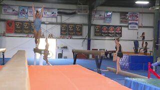 Local gymnasts are rooting for America's first Hmong American athlete
