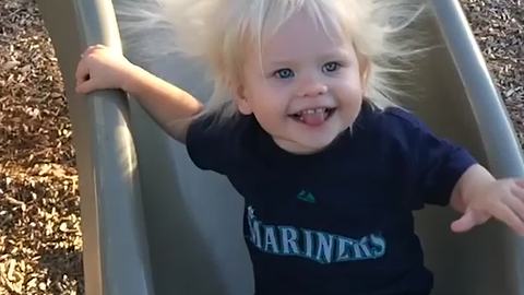 Slide makes Little Boy’s Hair Stand On End