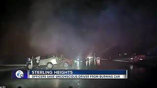 VIDEO: Sterling Heights police officers save man from burning car