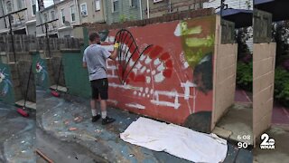 Alley beautification project helps combat illegal dumping