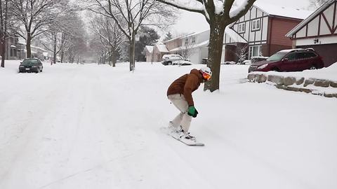 Snowboarding throughout the city of Toronto