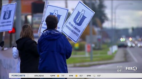 Healthcare workers protest employer