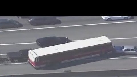 Runaway bus smashes through traffic during police chase