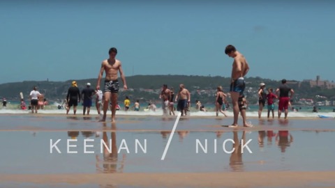 Slow motion aerobic beach stunts in Sydney