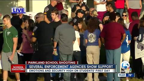 Strong community support for Stoneman Douglas HS students on 1st day back after shooting