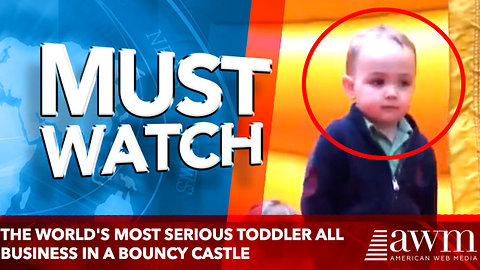 The world's most serious toddler keeps things professional in a bouncy castle