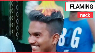 Moment Indian barber lights customer's hair on FIRE during innovative haircut