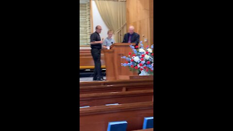 Phil, Jesse and Raleigh singing at Church