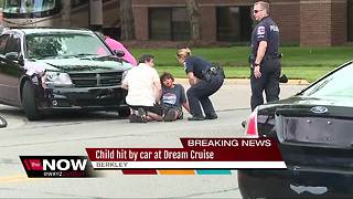 Child on bike hit by car at Dream Cruise