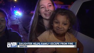 Girl hailed as hero for helping family escape fire