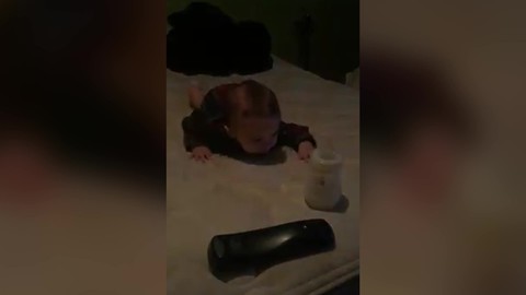 "Baby Boy Leaps and Knocks Off His Bottle"