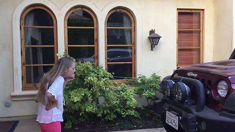 "A Girl Ties Her Loose Tooth To The Front Of A Car To Pulls It Out"