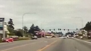 Police car dash cam captures airplane landing on Washington road