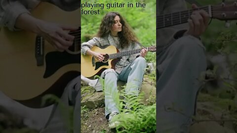 playing guitar in the forest