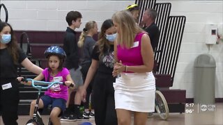 Local kids with disabilities learned how to ride bikes