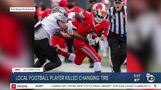 Local football player killed changing tire