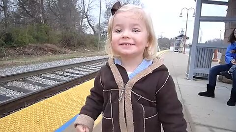 Small girl waiting for train 🚂