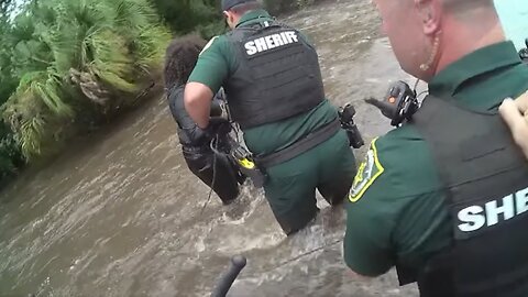 Sheriff's deputies rescue woman trapped in surging waters