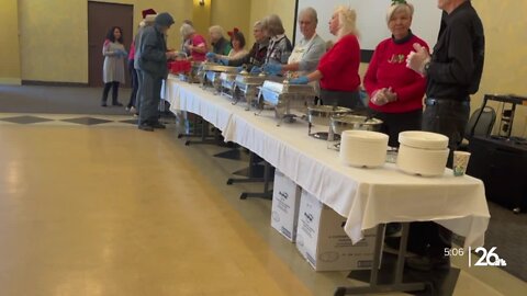 Volunteers bring a free Christmas meal to the community