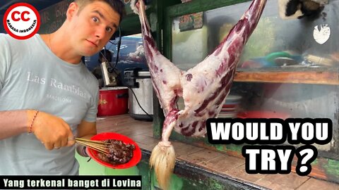 Foreigners try Indonesian food - Sate Kambing