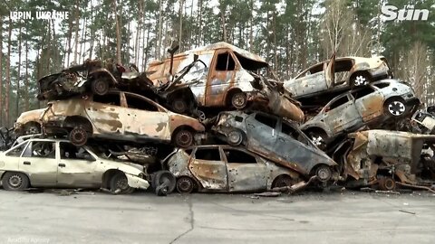 Vehicles destroyed by Russian attacks create auto graveyard in Irpin, Ukraine