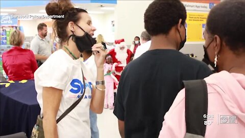 'Shop with a Cop' event helps officers build relationships with families in public housing