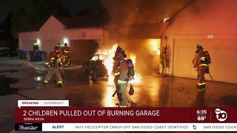 Good Samaritans rescue 2 kids from burning garage