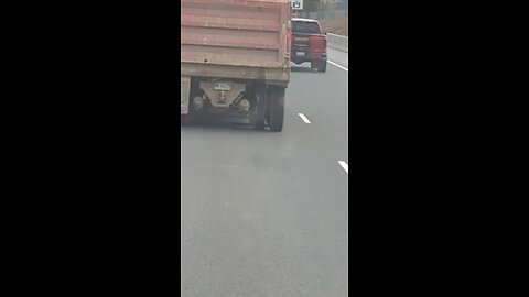Truck driving with flat tire on highway 401