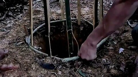 7- Dig a hole to build an underground shelter with a built-in fireplace to live in for a year!