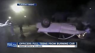 Milwaukee Police save 2 people from burning car
