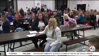 Chaos erupts at school board meeting set to discuss a cellphone tower placed on top of a Wyandotte school