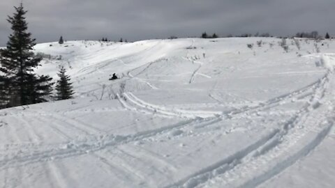 Snowmobile (snowmachine) Jump in Alaska