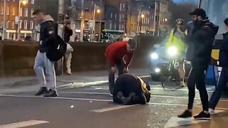 Muslim Praying To Mecca In The Middle Of The Road, Blocking A Bus In Dublin
