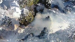 Firefighters Use Snowcat To Reach Fire Scene