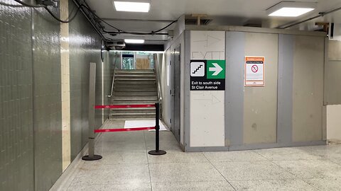 Trudging through south-side entrance (St. Clair West station, Toronto TTC)