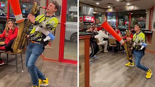 Traffic Cone Sax Man Strikes At Pizza Place
