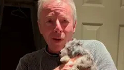 Father's Heartwarming Reaction to New Puppy Fills Hamilton Home with Love and Hope