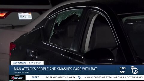 Man smashes cars with bat, woman hurt in incident