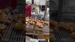 Making donuts at Krispy Kreme￼