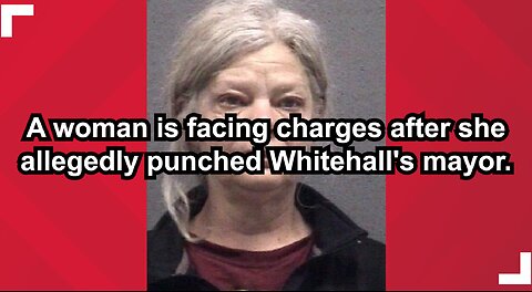 A woman is facing charges after she allegedly punched Whitehall's mayor.