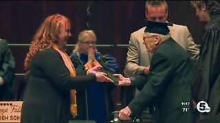 98-year-old veteran graduates high school with great-grandchild