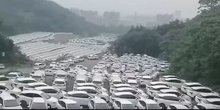 China is Throwing Away Fields of Electric Cars - Letting them Rot SCAM ALERT