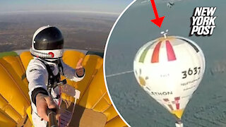 Full of 'hot air': Man stands on top of balloon 13K feet up