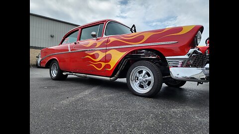 56 Chevy custom headers and side pipes.