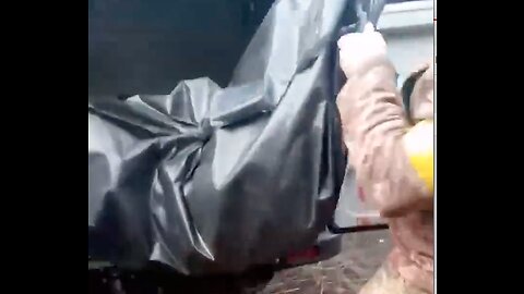 The Bakhmut meat grinder! Ukrainian soldier loading dozen of body bags into a van!