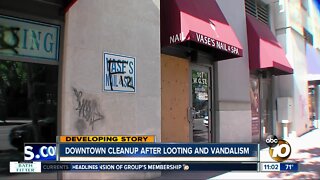 Downtown cleanup after looting and vandalism
